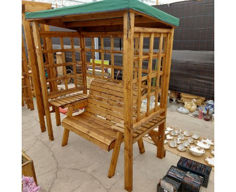 AN AS NEW EX DISPLAY CHARLES TAYLOR TWO SEATER BENCH WITH A TRELIS CANOPY AND TWO ARM REST TABLES *PLEASE NOTE VAT TO BE PAYE