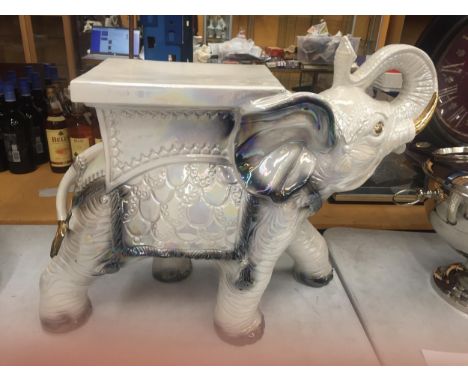 A DECORATIVE CERAMIC GARDEN ELEPHANT SEAT WITH PEARLESCENT DESIGN AND GILT HIGHLIGHTS, HEIGHT 48CM 