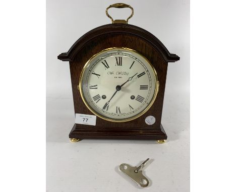 * A PRESENTATION MANTLE CLOCK BY WM WIDDOP, HEIGHT 25CM, PRESENTED BY G.M.P A DIVISION 1991 