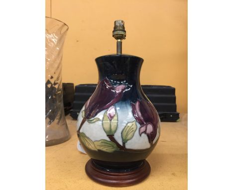 A MOORCROFT POTTERY PURPLE FLORAL PATTERN TABLE LAMP 