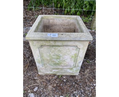 A SQUARE STONEWARE GARDEN PLANTER 