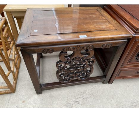 AN ASIAN HARDWOOD LAMP TABLE WITH CARVED PANEL, 24X18.5" 