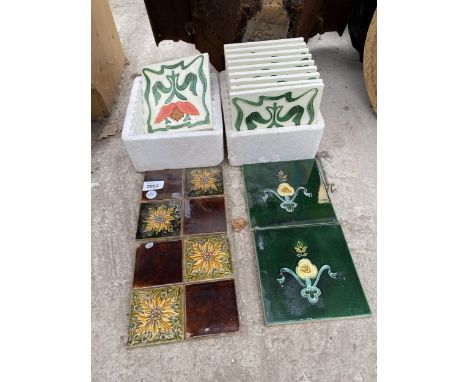 AN ASSORTMENT OF DECORATIVE CERAMIC TILES 