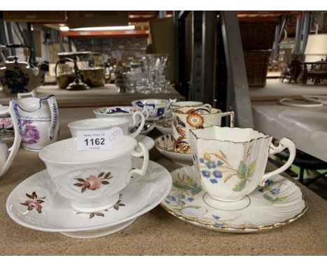 A COLLECTION OF TEA CUPS AND SAUCERS, GAUDY WELSH EXAMPLE ETC 