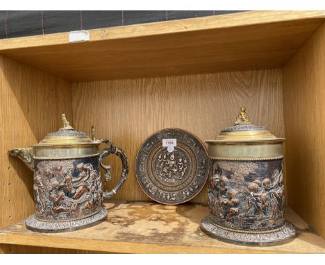 A GROUP OF THREE VINTAGE BI-METAL ITEMS - BRASS AND COPPER JUG WITH MATCHING LIDDED BARREL AND FURTHER MIDDLE EASTERN DISH 