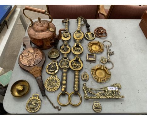 A COLLECTION OF VINTAGE HORSE BRASSES ON LEATHER, COPPER KETTLE, BELLOWS ETC 