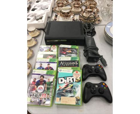 AN X-BOX 360 CONSOLE, POWER PACK, CONTROLLERS AND A QUANTITY OF GAMES TO INCLUDE FIFA '13, '14 AND '15, DIRT 3, ETC 
