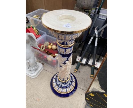 A MAJOLICA STYLE CERAMIC JARDINIERE STAND 