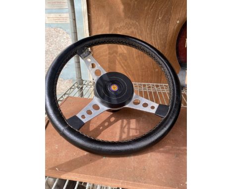 A VINTAGE ASTRALI, GREAT BRITAIN CAR STEERING WHEEL 