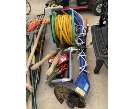 A GROUP OF GARDEN TOOLS, HOSE AND REEL, STRIMMER ETC 