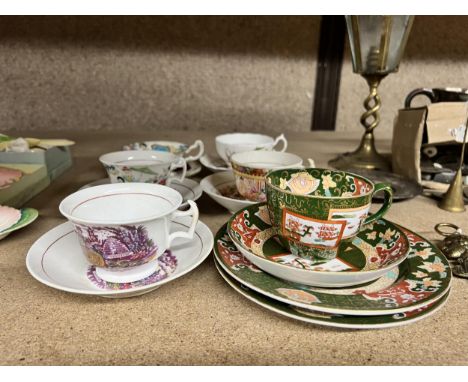 A QUANTITY OF ORIENTAL CUPS AND SAUCERS 