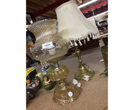 TWO TABLE LAMPS, ONE BRASS, THE OTHER IN THE STYLE OF AN OIL LAMP 