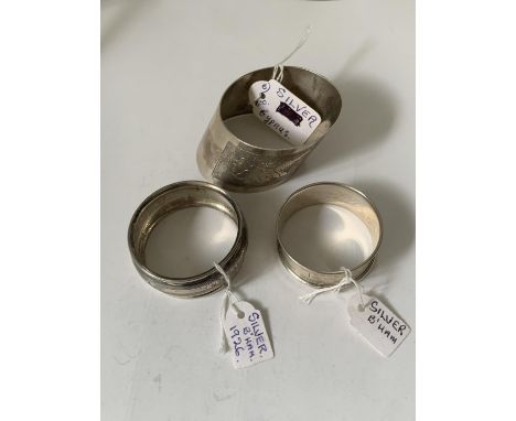 TWO HALLMARKED BIRMINGHAM SILVER NAPKIN RINGS AND A FURTHER SILVER RING WITH A MAP OF CYPRUS 