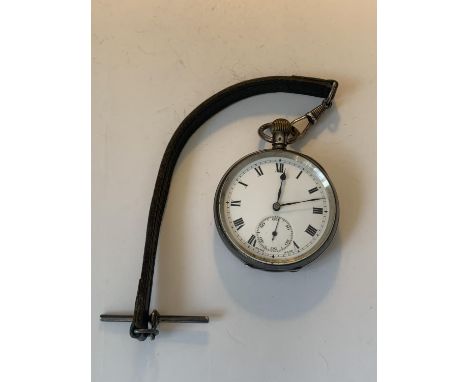 A MARKED 925 SILVER POCKET WATCH WITH WHITE ENAMEL FACE, ROMAN NUMERALS AND SUB DIAL ON A LEATHER T BAR STRAP 