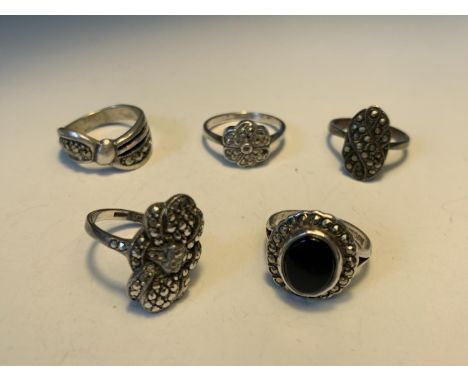 FIVE SILVER RINGS 