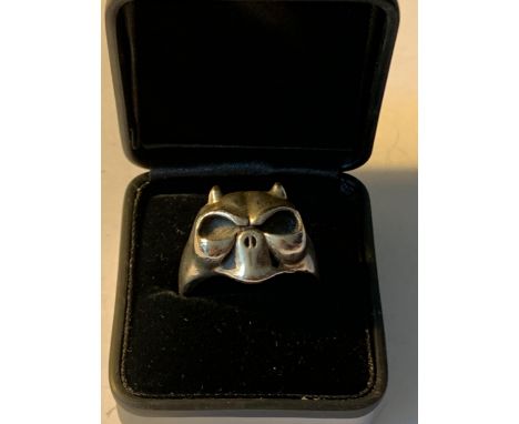 A LARGE SKULL RING IN A PRESENTATION BOX 