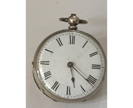 A MARKED FINE SILVER POCKET WATCH WITH WHITE ENAMEL FACE AND ROMAN NUMERALS 