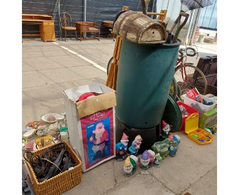 A LARGE ASSORTMENT OF ITEMS TO INCLUDE HORSE TACK, GNOMES AND GARDEN TOOLS ETC 