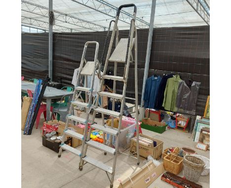 A FIVE RUNG ALUMINIUM AND A FURTHER SIX RUNG ALUMINIUM STEP LADDER 