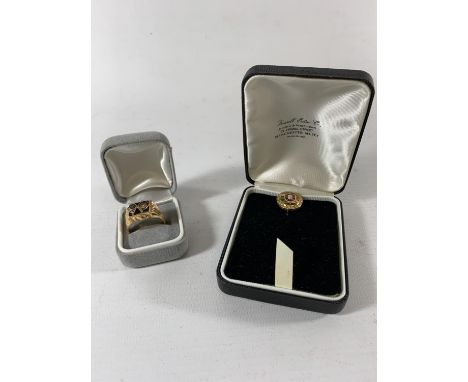 * A YELLOW METAL ENAMEL RING, DECORATED WITH UNION JACK AND PORTUGUESE FLAGS AND DIAMOND PORTUGUESE LAPEL BADGE, WEIGHT 3.97G