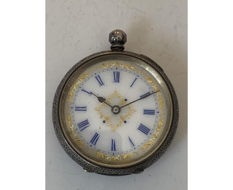 A MARKED 935 SILVER POCKET WATCH WITH WHITE ENAMEL AND FLORAL DECORATION FACE AND ROMAN NUMERALS (A/F NO CROWN WINDER) 