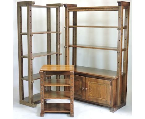 A late 20th century continental oak cabinet bookcase, 118cm, together with an open bookcase and a matching shelf unit