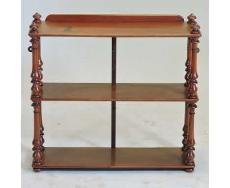 A mahogany three tier wall shelf, 61cm