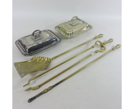 A pair of silver plated entree dishes, together with a set of brass fire tools