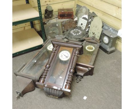 A collection of clocks and clock parts, to include Vienna regulators and longcase clock movements and dials, together with ot