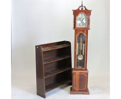 A modern longcase clock, 165cm tall, together an open bookcase