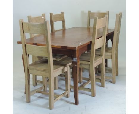 A modern hardwood extending dining table, 170 x 90cm overall, together with a set of six ladder back dining chairs