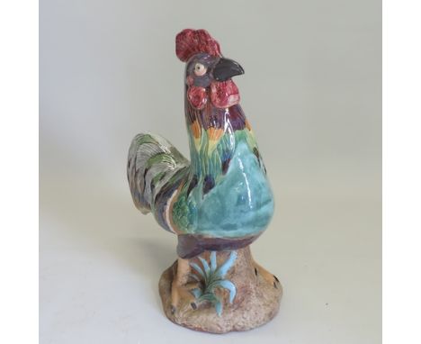 A large pottery model of a cockerel, 77cm tall