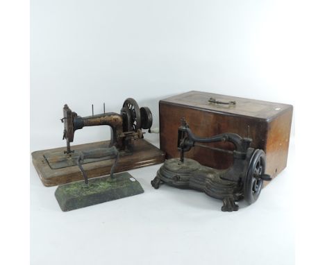 A vintage sewing machine, together with another, boxed, 49cm, and a flat iron