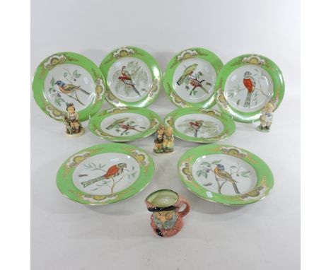 A Staffordshire style part dessert service, painted with birds, together with Goebel figures and others