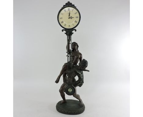A 19th century style figural mantel clock, 32cm high