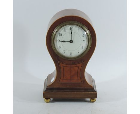 An Edwardian walnut balloon shaped mantel clock, 28cm high