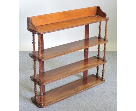 A 19th century mahogany four tier wall shelf, 92cm