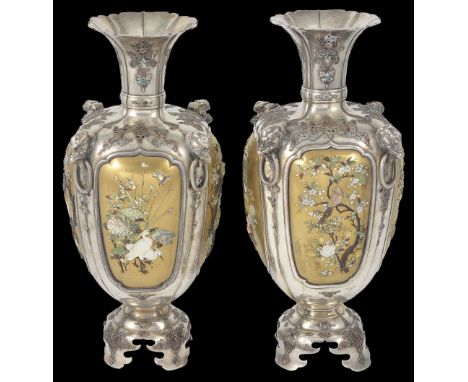 A PAIR OF JAPANESE SILVER AND LACQUER VASES, MEIJI PERIOD (1868-1912) the lobed bodies each set with four gold lacquer panels