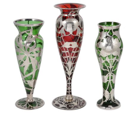 THREE AMERICAN SILVER-MOUNTED GLASS VASES, UNMARKED, EARLY 20TH CENTURY the largest ruby glass, the others dark green glass, 