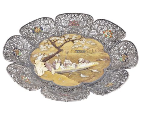A JAPANESE SILVER AND LACQUER DISH, MEIJI PERIOD (1868-1912) flowerhead shaped, centred by a 'Shibayama' work landscape panel