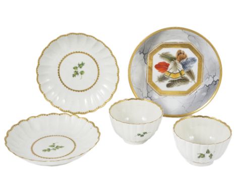A pair of Worcester fluted teabowls and saucers, circa 1770 painted with green flower sprigs beneath gilt dentil rims; togeth