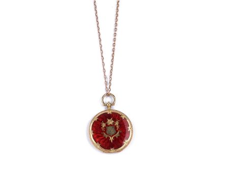 ENAMEL LOCKET, LATE 19th CENTURY the circular guilloché enamel locket opening to reveal two glazed sides on a fine link chain