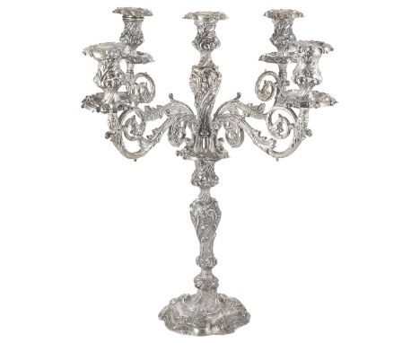 A SILVER FIVE-LIGHT CANDELABRUM, WALKER & HALL, LONDON AND SHEFFIELD, 1895/1903 in Rococo Revival taste of smothering scrolls