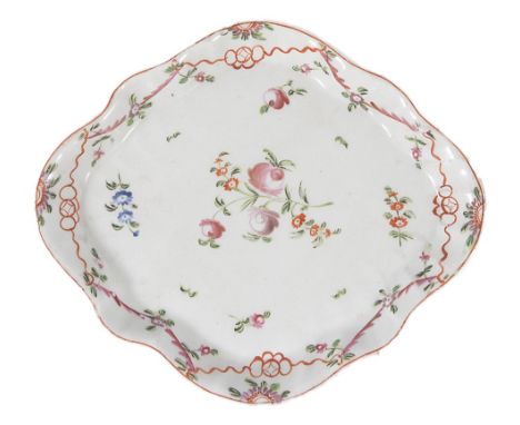 A New Hall PORCELAIN teapot stand, LATE 18TH CENTURY silver shaped fluted, painted with flower sprigs inside an orange lined 