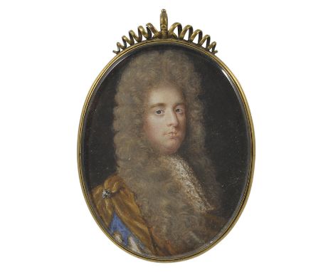 A PORTRAIT MINIATURE OF A GENTLEMAN, ENGLISH SCHOOL, CIRCA 1690 with a full bottomed light brown wig, gold drape and lace cra