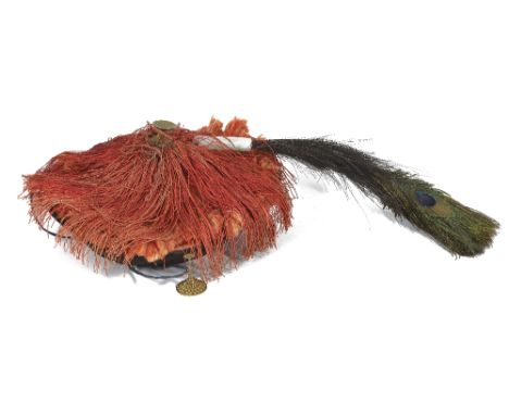 A CHINESE MANDARIN OFFICIAL'S HAT, ZHAO GUAN, CIRCA 1850 of black velvet with red silk tassels issuing from a central finial 