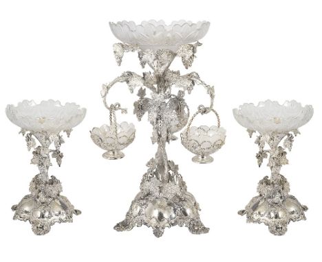 A VICTORIAN SILVER THREE-PIECE TABLE GARNITURE, THOMAS BRADBURY & SONS, LONDON, 1874/75 comprising a centrepiece with cut and