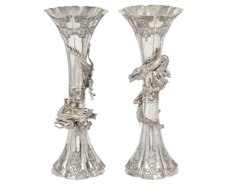 A PAIR OF JAPANESE SILVER VASES, MEIJI PERIOD (1868-1912) slender waisted and lobed cylindrical, one applied with a downwards