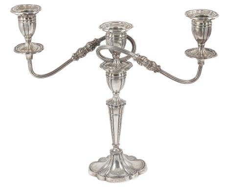 A GEORGE V SILVER THREE-LIGHT CANDELABRUM, POSTON PRODUCTS LTD., BIRMINGHAM, 1964 shaped oval outline with ribbed and reeded 