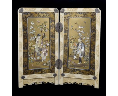 A JAPANESE IVORY AND LACQUER TABLE SCREEN, MEIJI PERIOD (1868-1912) the two folds each set with a gold lacquer 'Shibayama' de